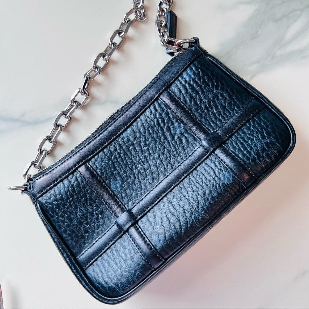 Authentic MCM Mini Delmy Visetos Leather Monogram Pochette